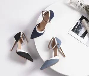 Close-up view of denim pointed-toe pumps with ankle straps in three colors