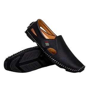 Breathable men's black leather slip-on loafers with stylish cutout details