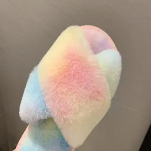 Detailed close-up showing the soft texture of rainbow cross-strap plush slippers