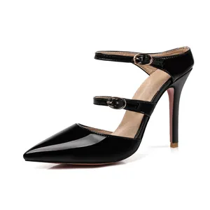 Side view of black patent leather pointed toe high heels with triple buckle straps