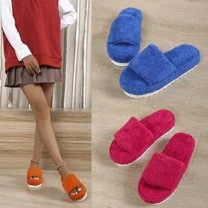 Soft plush toweling slippers with thick platforms in blue, magenta, and orange colors