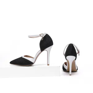 Elegant black and white denim pointed-toe high heels with stylish ankle strap detail