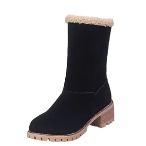 Detailed view of women's black mid-calf snow boots featuring cozy cream sherpa fleece trim