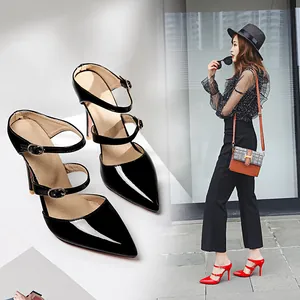 Sexy vintage pointed-toe stiletto pumps with double straps shown on model and close-up