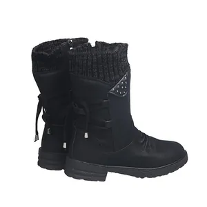 Vintage black mid-calf Martin boots with chunky heel and decorative back lace-up