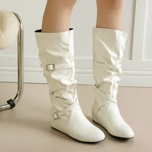 White slouchy mid-calf boots for women featuring a pleated design and buckle straps