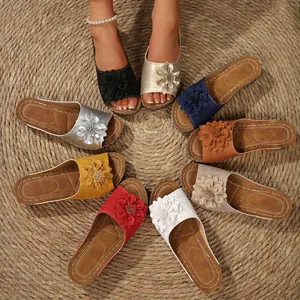 Stylish women's floral wedge slippers with thick soles ideal for summer beach outings.