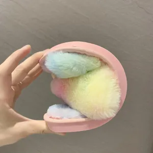Detail view showing the high flexibility and soft rainbow fur of indoor slippers