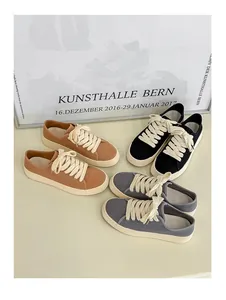 Sneakers in tela da uomo dal design retrò disponibili nei colori marrone nero e grigio