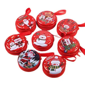 Set mit acht runden Weihnachts-Blechgeldbörsen mit festlichen Weihnachtsmotiven
