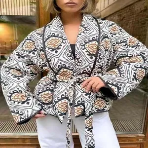 Women's stylish geometric print tie-waist padded jacket featuring contrast piping trim