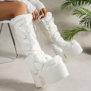 White Gothic Lolita platform boots with faux fur trim and chunky high heels detail