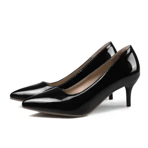 Side view of elegant 6cm mid-heel black patent leather pointed toe stiletto pumps for women