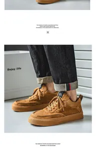 Close-up view of brown suede lace-up casual skateboard shoes for men