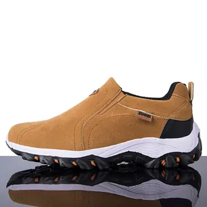 Durable men's brown suede outdoor hiking sneakers showing the side profile and rugged sole