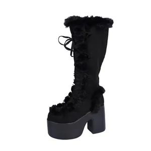 Side view of Gothic Lolita platform boots with faux fur trim and chunky high heels