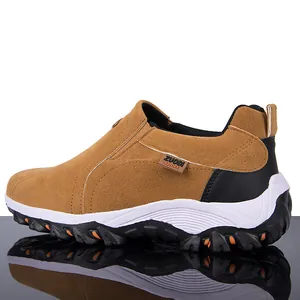 Side view of tan suede men's outdoor casual hiking shoe with rugged non-slip lug sole.