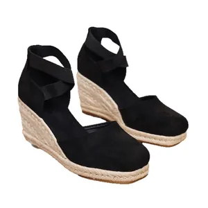 Elegantes sandalias de cuña trenzadas en paja negra con tiras elásticas para mujer