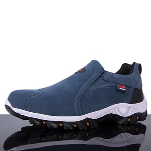 Detailed side view of blue suede slip-on casual hiking shoes with ZUODI sport branding