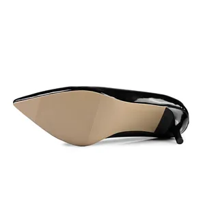Close-up detail view of the anti-slip sole and 6cm stiletto heel on black patent leather pumps