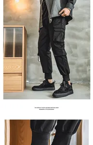 Close-up detail of black suede lace-up casual sneakers showing texture and urban style