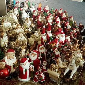 Collezione di statuette di Babbo Natale in resina rossa e oro per decorazioni natalizie