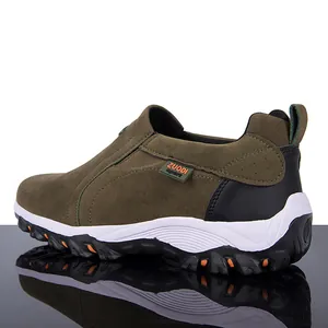Professional side view of olive green suede men's outdoor hiking shoes with white sole