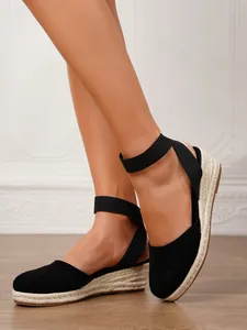 Elegantes sandalias de cuña tipo esparteña en lona negra para mujer de verano