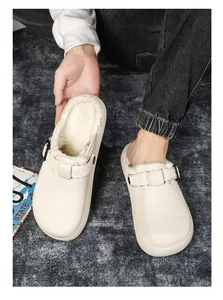 Close-up of men's warm lined clogs with cozy fleece interior and textured upper