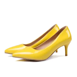 Elegant yellow patent leather pointed toe high heels with 6cm stiletto heel detail