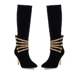 Elegant black suede knee-high boots with pointed toe and gold button decorative straps