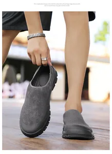 Comfortable grey suede slip-on mules for men featuring a durable non-slip rubber sole