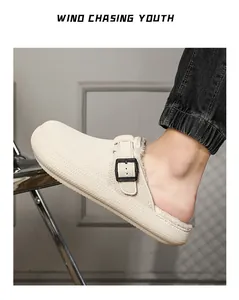 Detailed side view of warm beige fleece-lined men's clogs featuring a stylish buckle strap