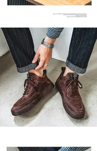 Detailed close-up view of Japanese Harajuku style brown suede men's casual board shoes.