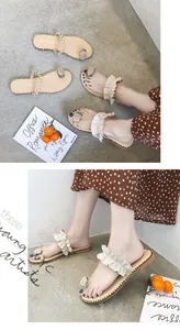 Close-up of summer flat sandals featuring pineapple toe decoration and ruffle strap