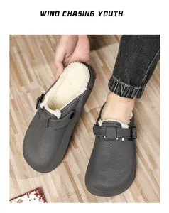 Detail showing warm white fleece lining and buckled strap of these gray men's clogs.