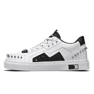 Men's fashionable low-top white sneakers with stylish silver metal rivets
