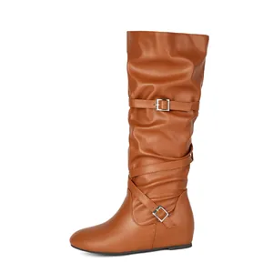 Detailed side view of brown slouchy mid-calf boots with stylish buckle straps for women
