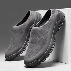 Grey suede slip-on men's mules with chunky rubber sole for outdoor casual wear