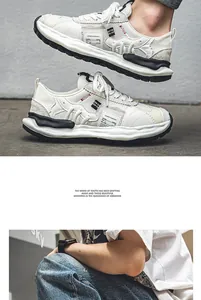 Detailed view of cream-colored men's sneakers featuring a unique dissolved sole design