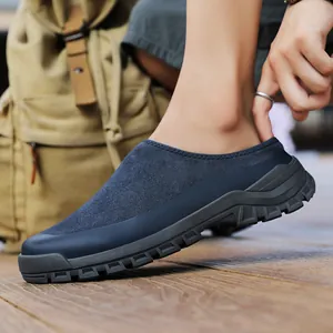 Men's comfortable navy blue suede slip-on casual mules featuring rugged anti-slip soles