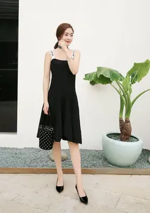 Stylish woman wearing elegant 6cm black pointed-toe stiletto heels for formal events