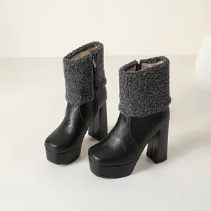 Elegant black platform high heel ankle boots featuring stylish grey shearling cuffs for women