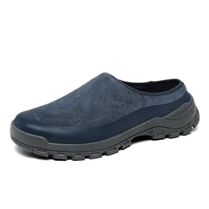 Comfortable navy blue suede men's casual slip-on mule with a thick grey lug sole unit.