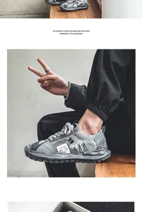 Close-up view of men's low-top gray sports running shoes featuring a thick melting sole design
