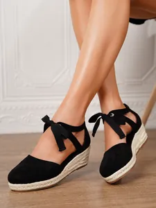 Elegantes sandalias de cuña tipo alpargata negras para mujer con cintas de lazo al tobillo