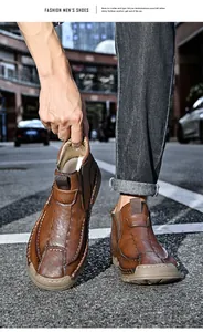 Detailed shot of brown leather outdoor loafers for men in a city street setting