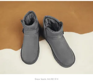 Cozy dark grey suede snow boots for winter with stylish buckle detail and warm fur lining