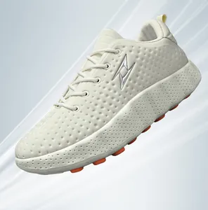 Detailed side view of off-white thick-soled dad sneaker with orange accents and textured upper