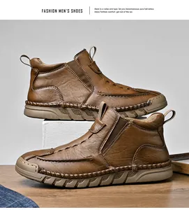 High-quality brown leather Chelsea boots for men featuring exquisite hand-stitched detailing